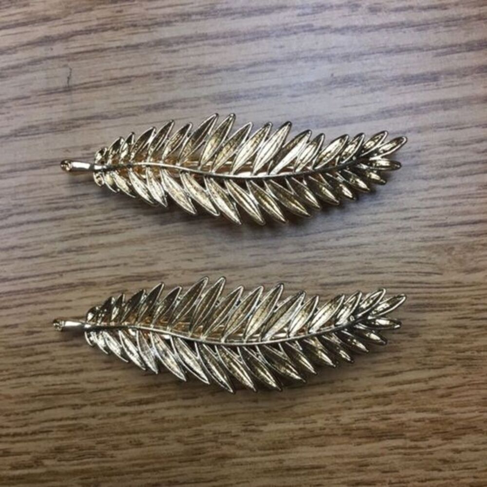 Pair of gold leaf hair clips